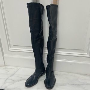 Givenchy women’s chain trimmed stretch leather over the knee boots.